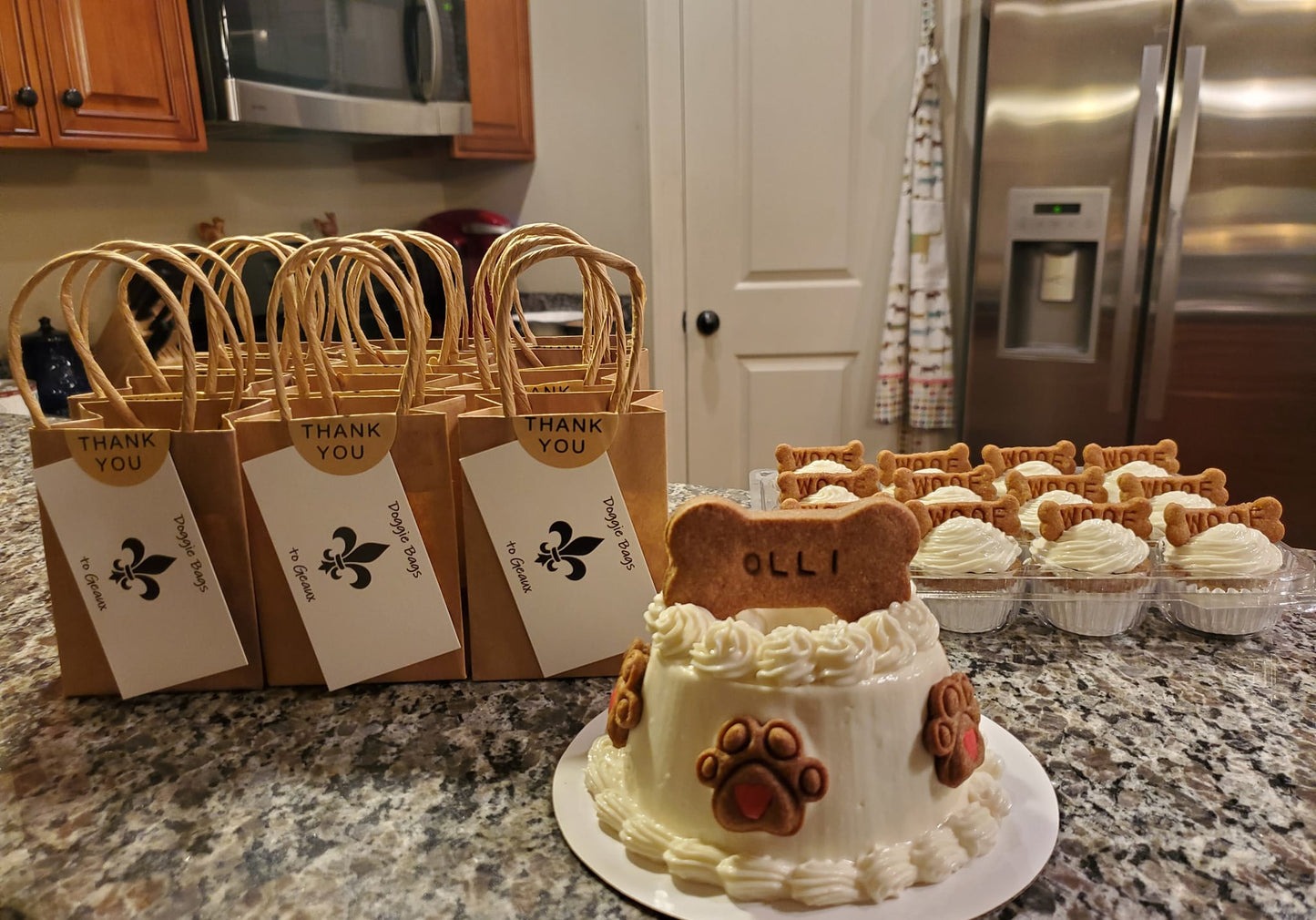 Cake with pupcakes and treat bags