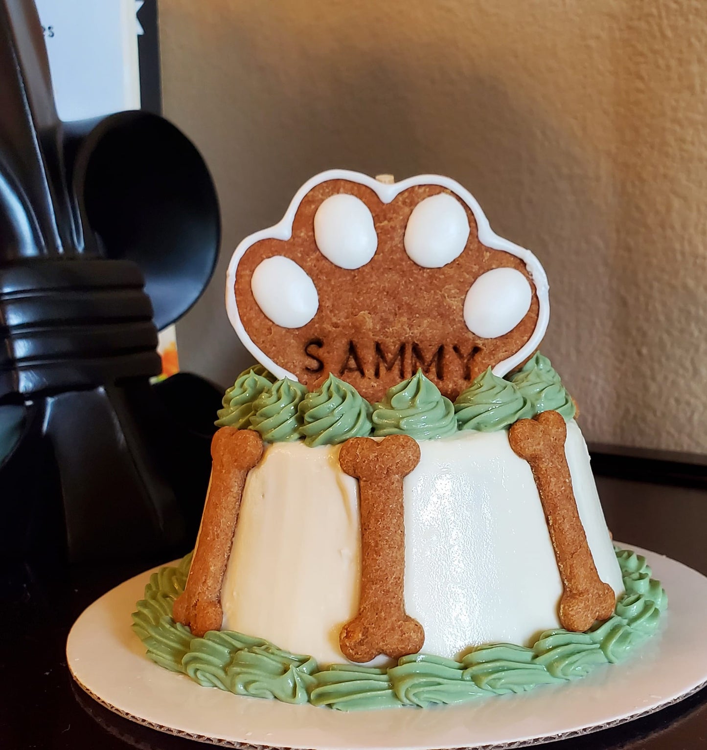 Cake with paw print topper