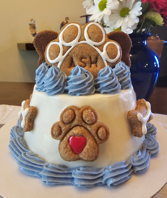 Cake with paw print topper